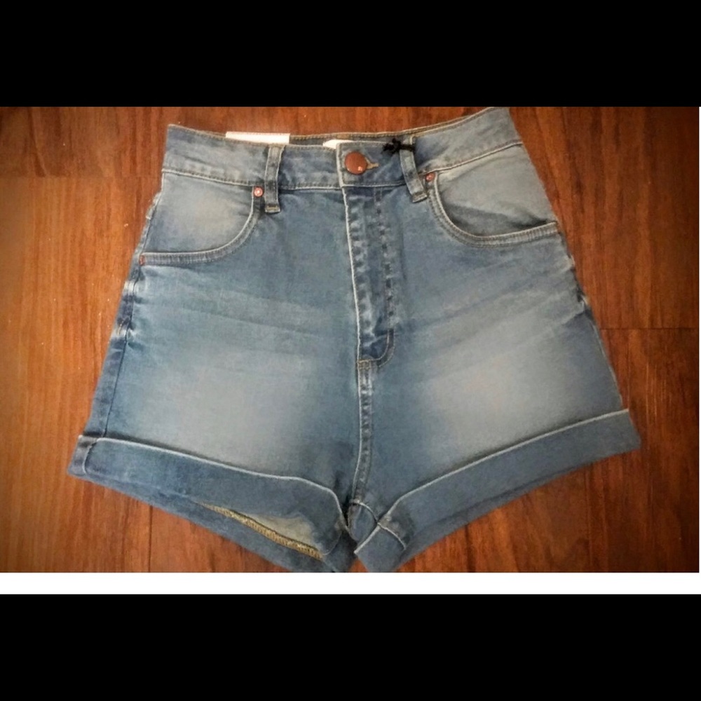 High waisted medium wash shorts